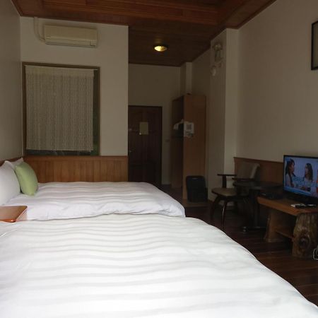 Seasons Inn Цзяоси Экстерьер фото